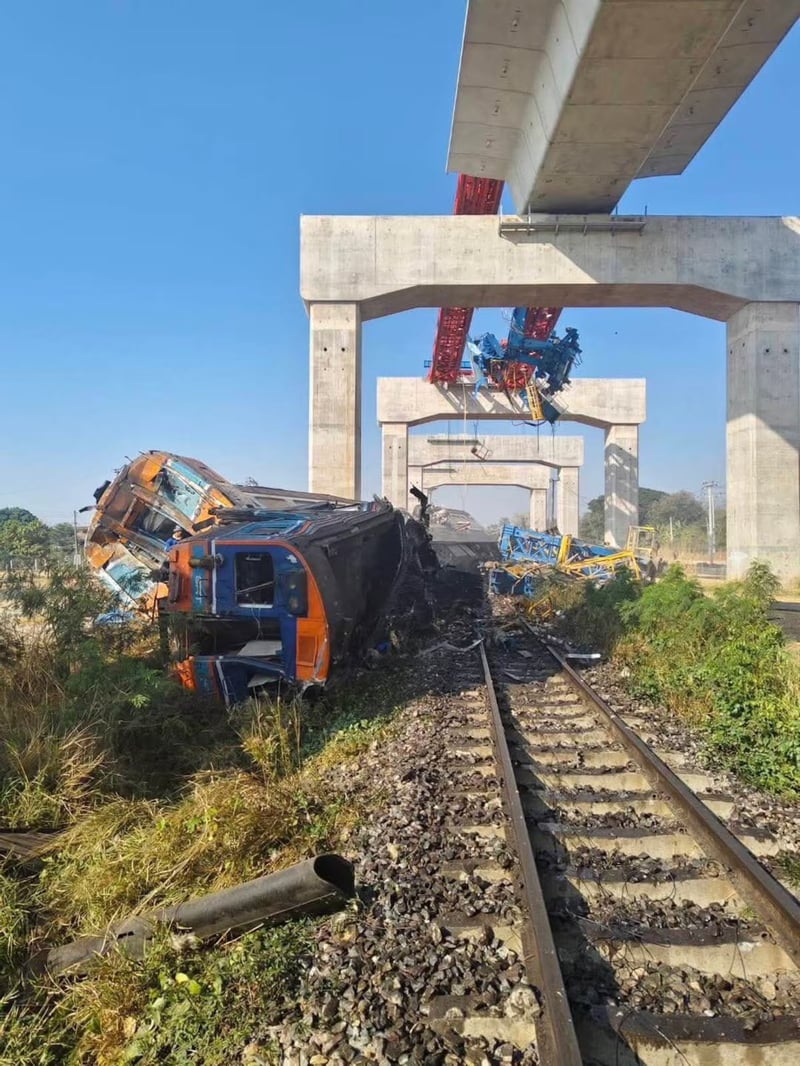 At least 25 killed after crane falls on train in Thailand, police say