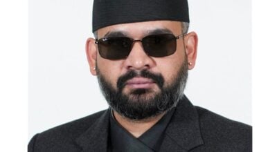 प्रधानमन्त्रीको अफिसियल फोटोमा पनि कालो चस्मा