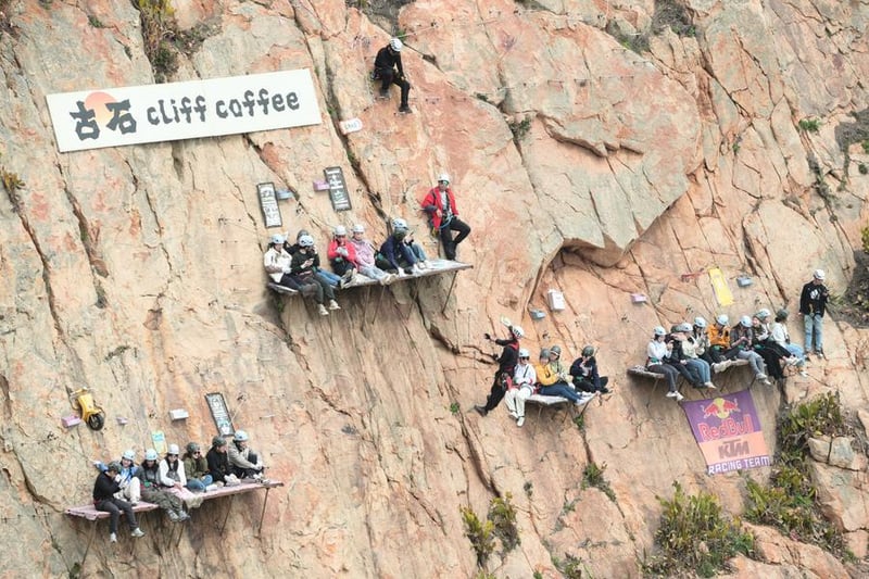 Thrill-Seekers Flock to China's 'Most Extreme' Cliffside Coffee Shop