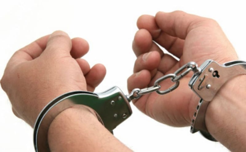 Two arrested on charge of taking youth hostage