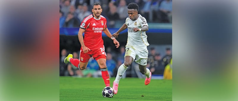 Champions League Vinicius helps Real progress as PSG edge out Monaco